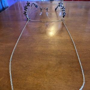 Flower embellished chain sunglasses